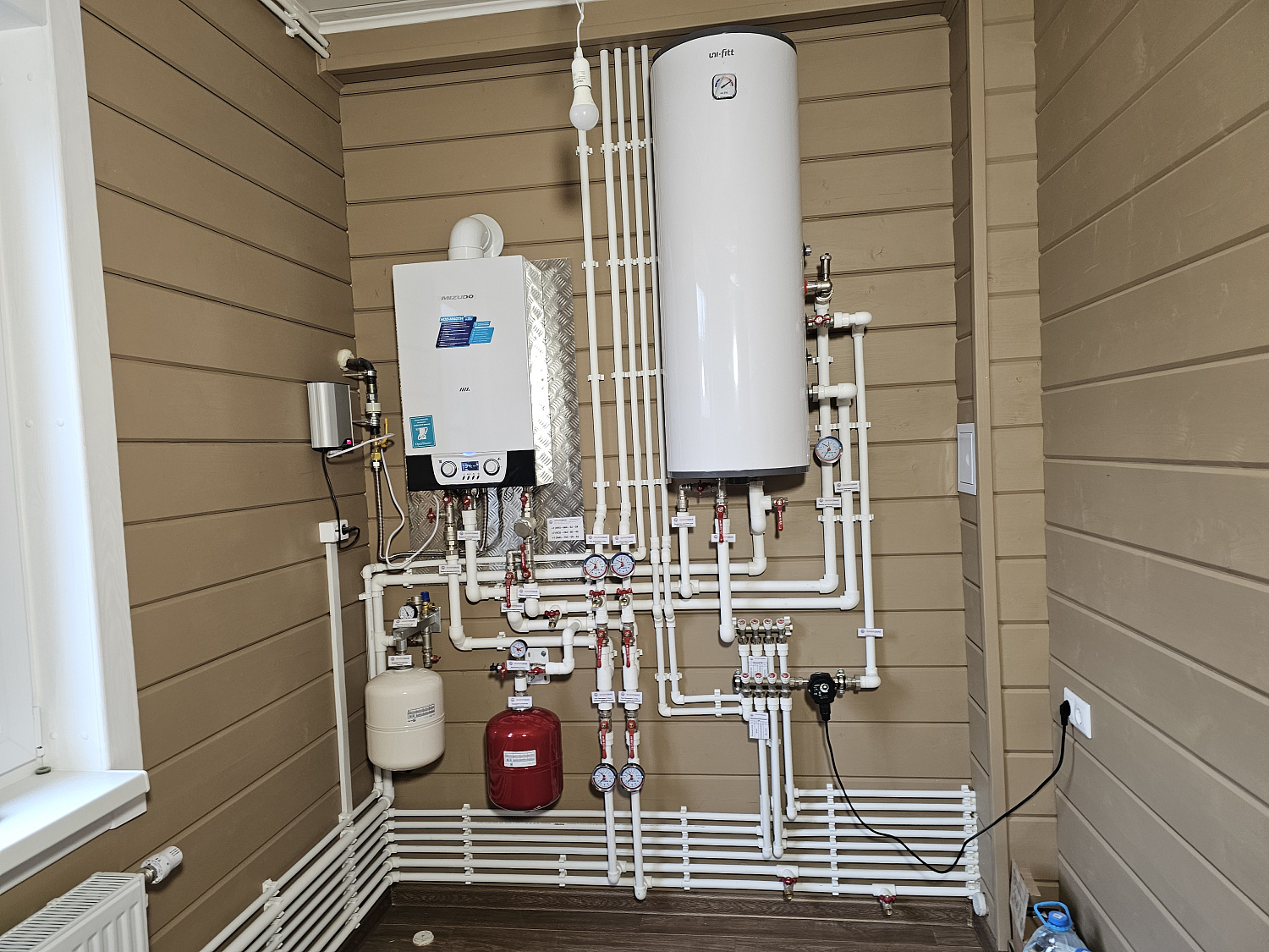 Монтаж котельной, радиаторного отопления, водоснабжения и водоотведение в деревянном доме 130м2