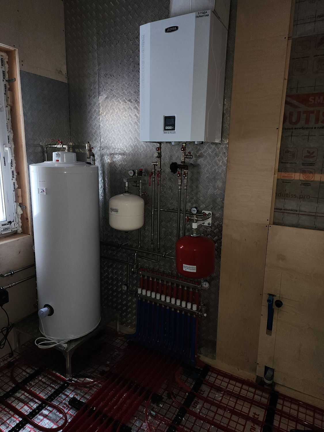 Комбинированная система отопления, тёплые полы и радиаторное отопление в КП Клинский район