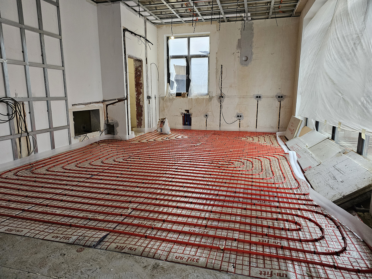 Монтаж теплого пола и радиаторного отопления в частном доме в КП Ренесанс