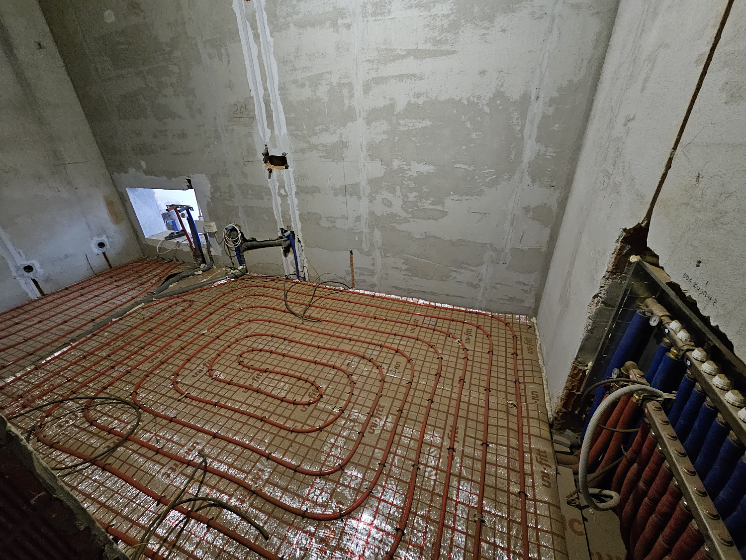 Монтаж теплого пола и радиаторного отопления в частном доме в КП Ренесанс