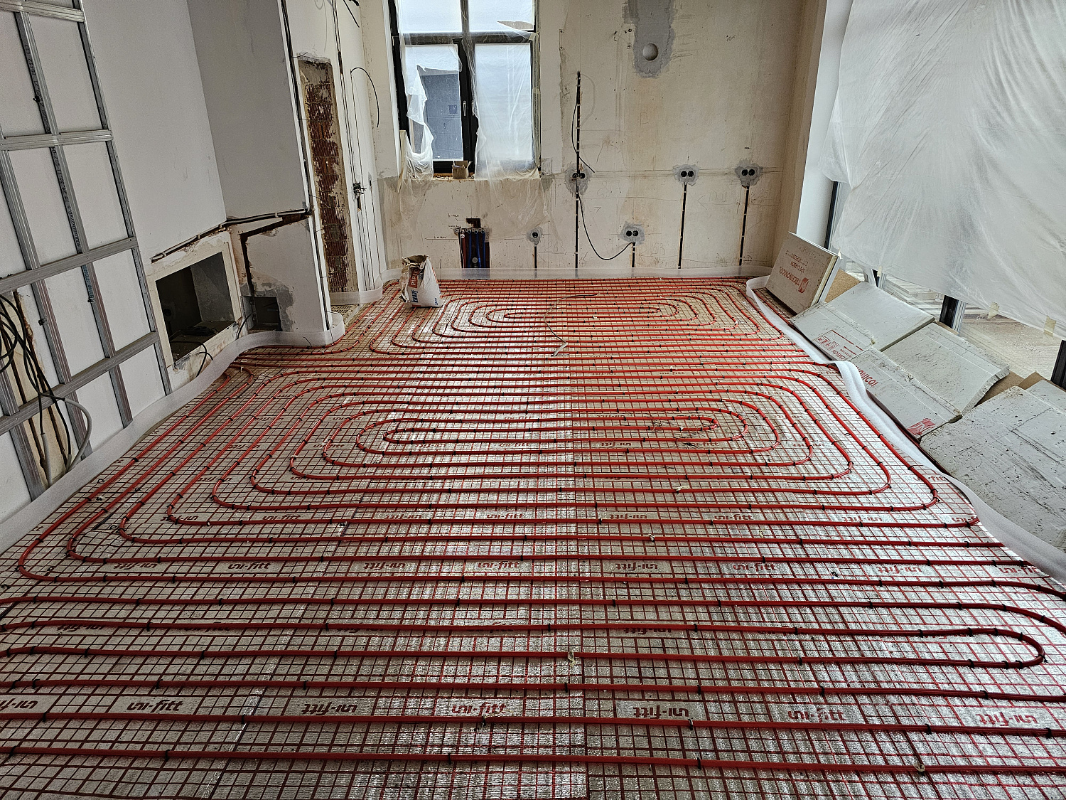 Монтаж теплого пола и радиаторного отопления в частном доме в КП Ренесанс