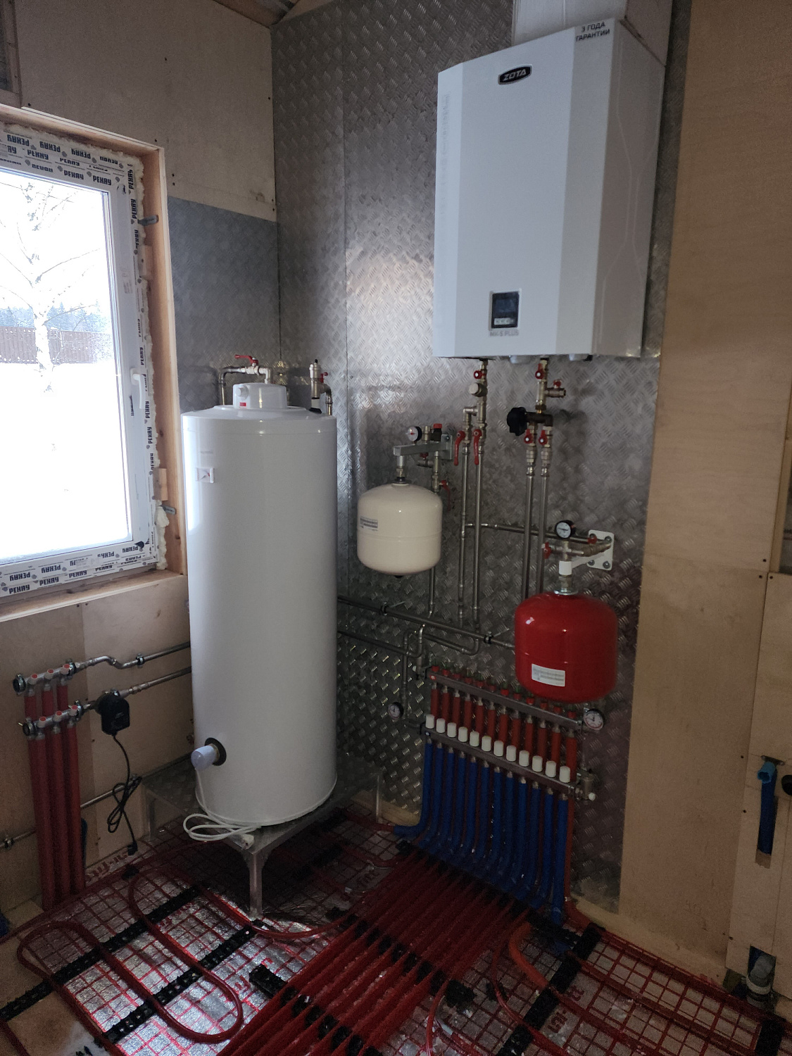 Комбинированная система отопления, тёплые полы и радиаторное отопление в КП Клинский район