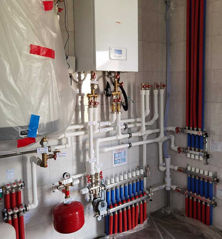 Монтаж теплых полов и котельной в загородном доме площадью 150 м2