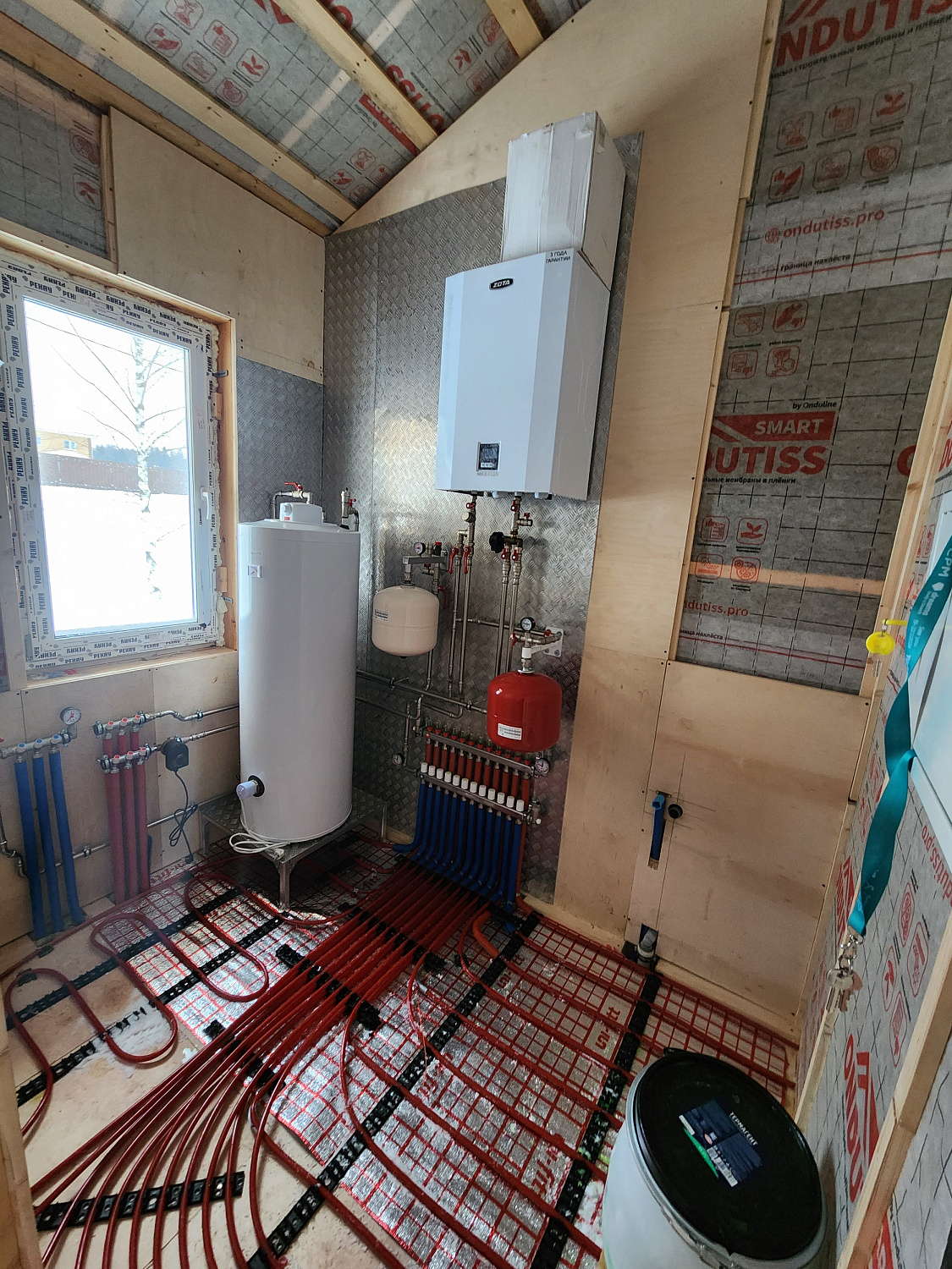 Комбинированная система отопления, тёплые полы и радиаторное отопление в КП Клинский район